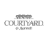 Courtyard by Marriott logo featuring three stylized trees above a serif wordmark in grayscale.